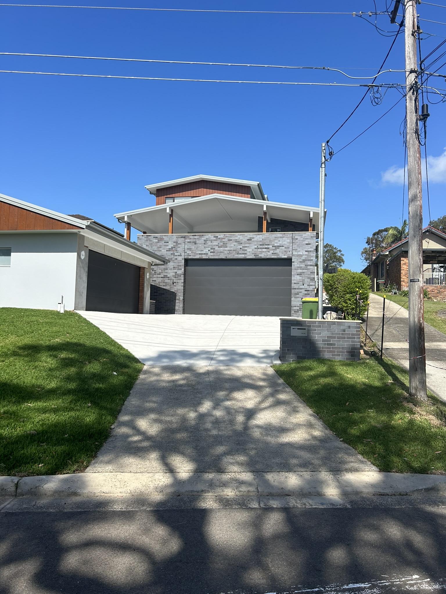 Sylvania Residence Architectural Remodel and Charcoal Brick Facade